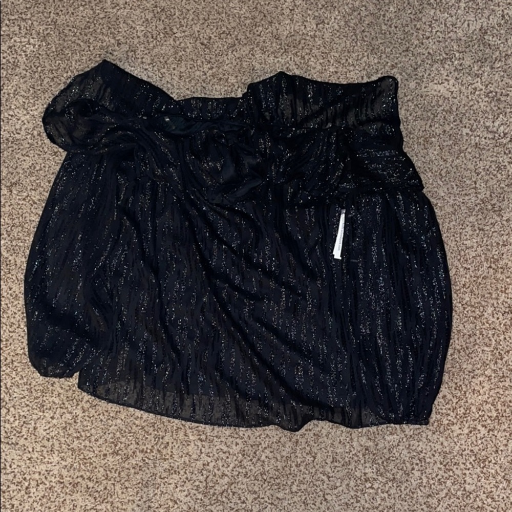 Black shoulder blouse.